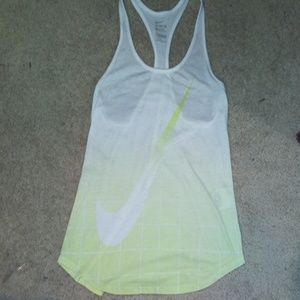 Green Nike tank top.